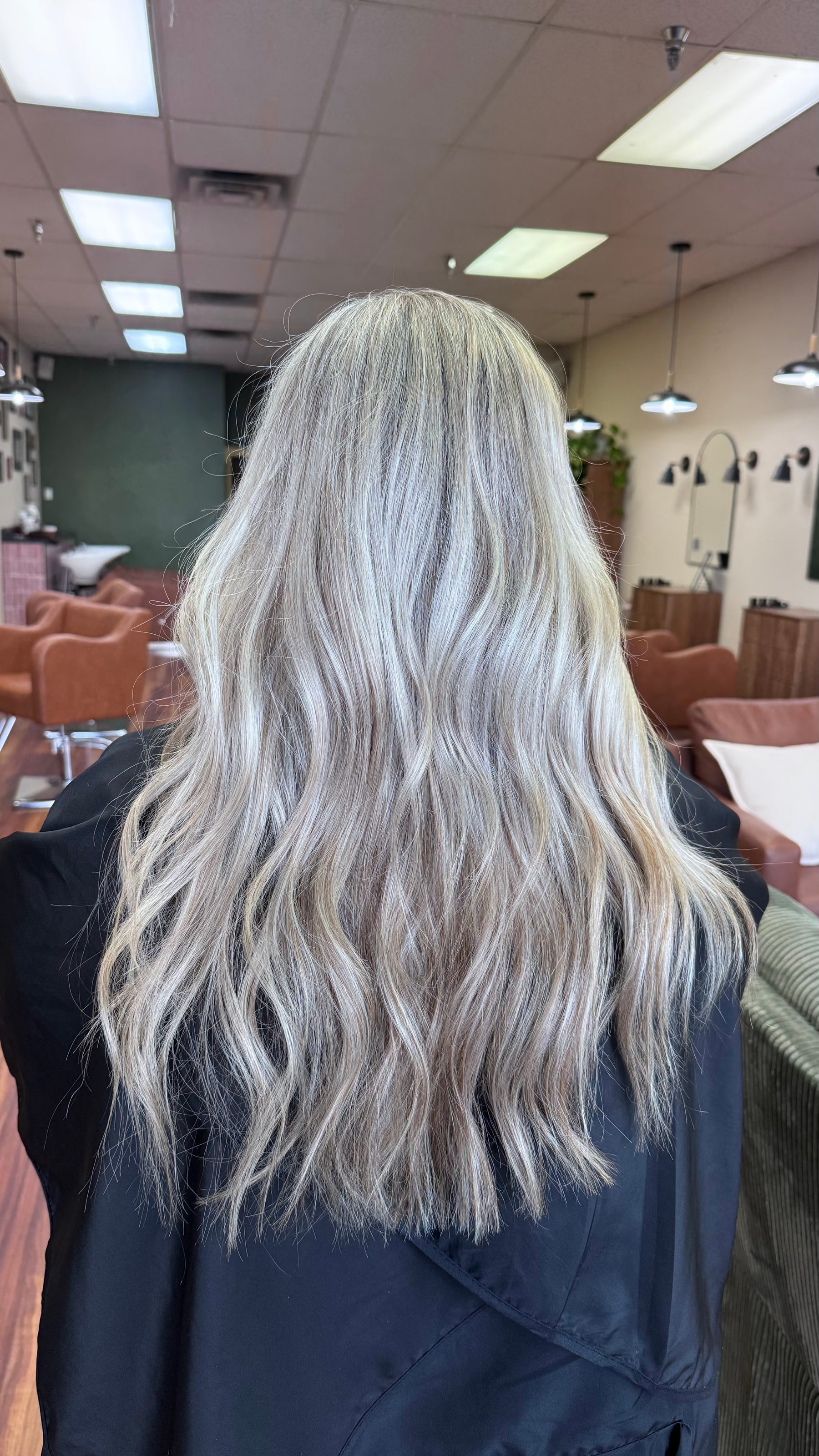 Long bright blonde with seamless dimension by Sariah