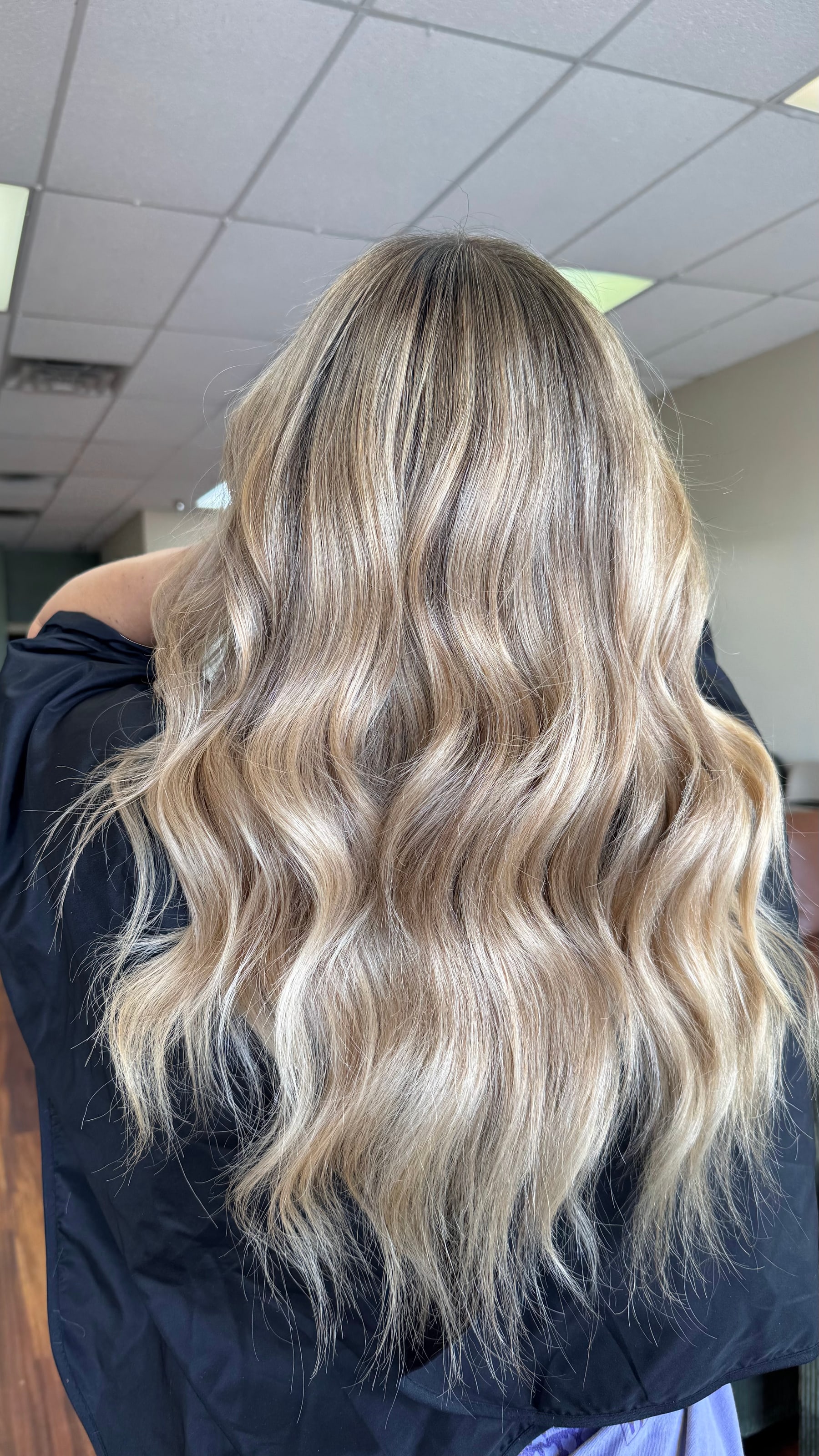 Dimensional blonde waves created by Sariah